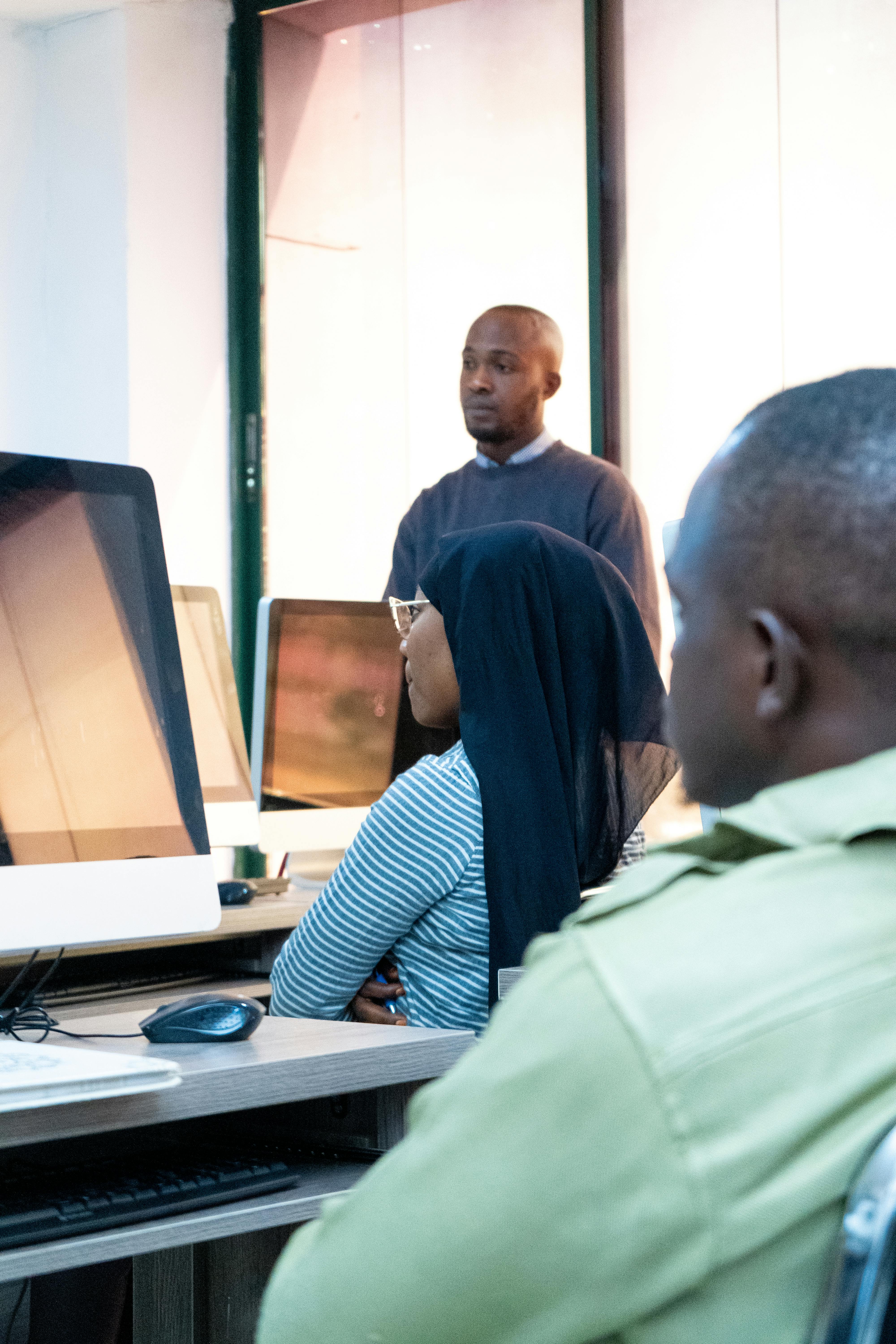 African students learning programming in a computer lab